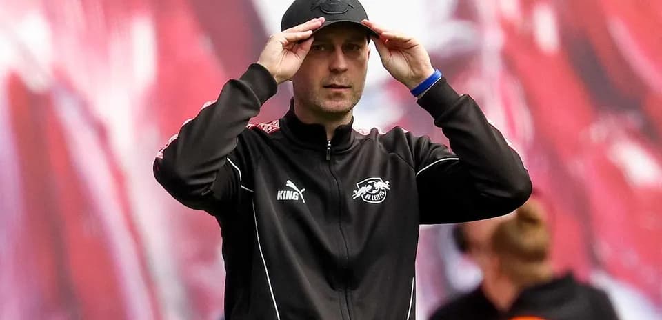 Coach adjusting his cap during training session