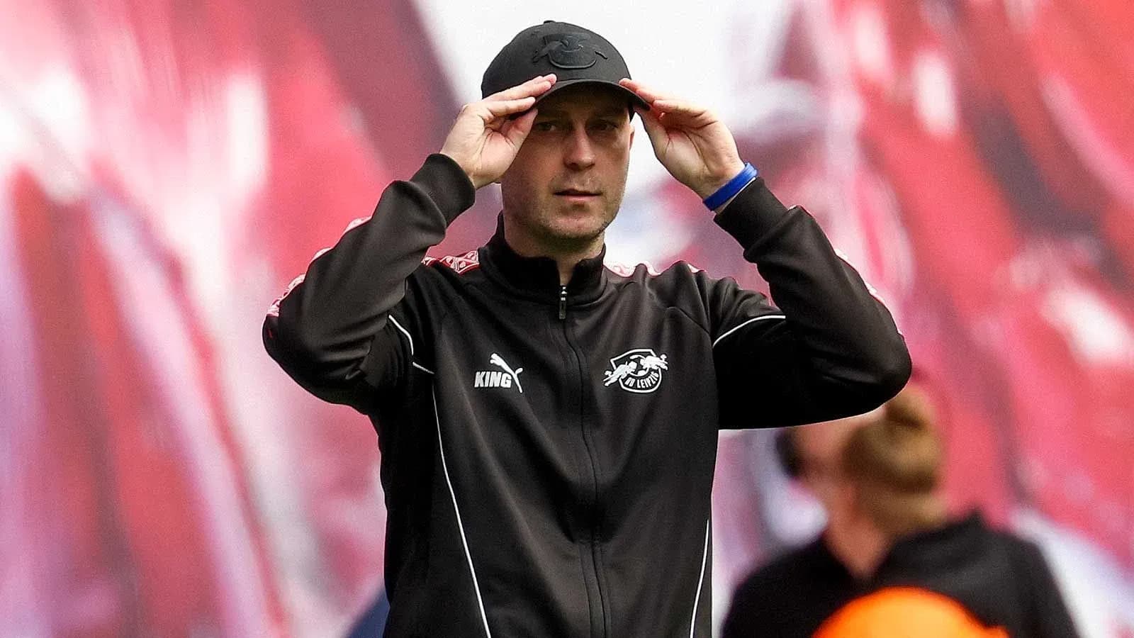 Coach adjusting his cap during training session