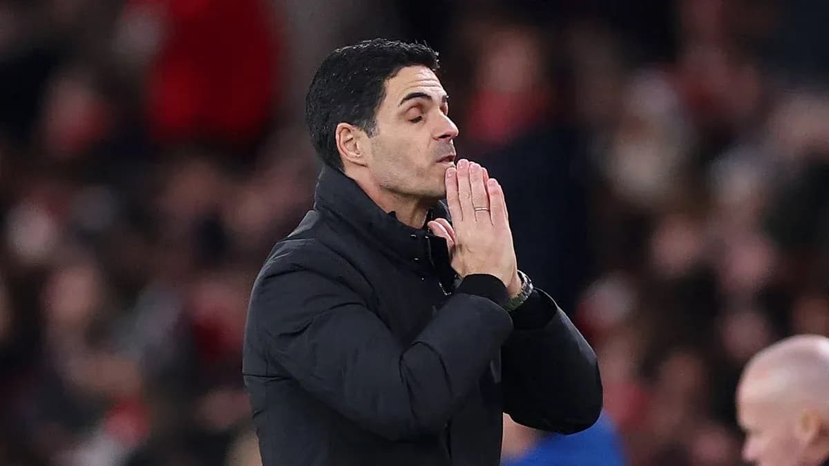 Coach gesturing during a football match