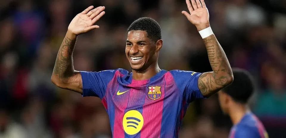 Player celebrating with raised hands during match