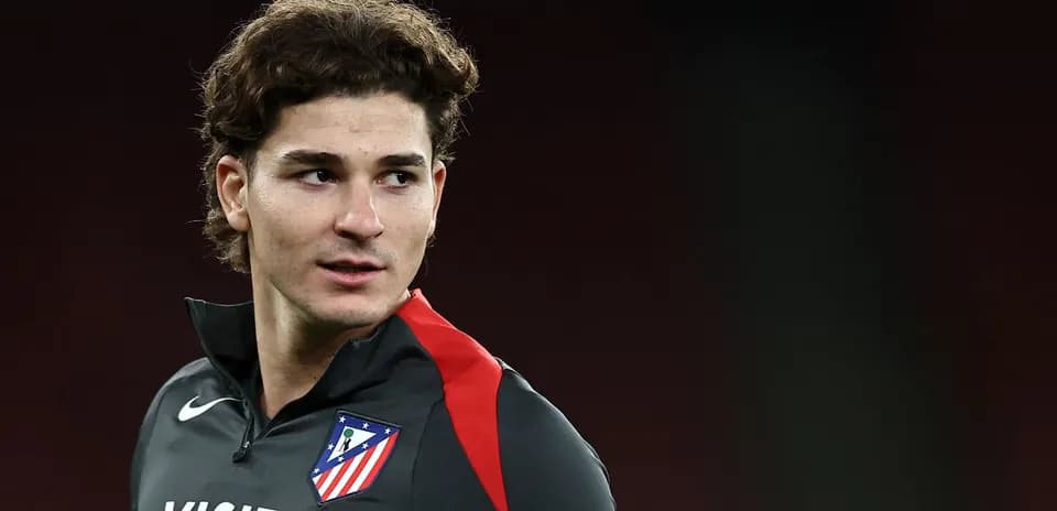 Athletic player in training gear with club logo