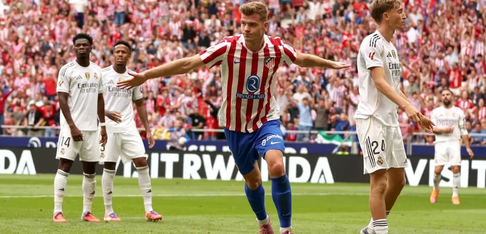 Atletico Madrid player celebrating goal against Real Madrid