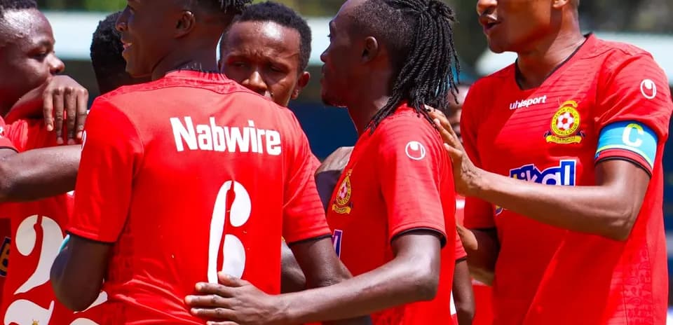 Players celebrating after a goal during match