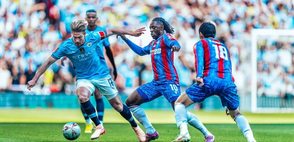 Manchester City players in action against Crystal Palace