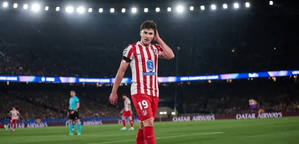Atletico Madrid player on pitch during UEFA match