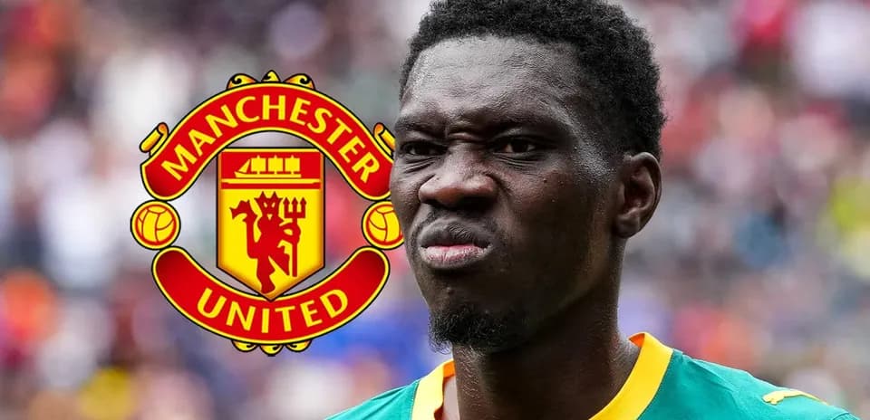 Player with Manchester United logo in background