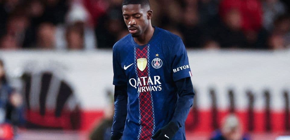 Player walking with head down in PSG jersey