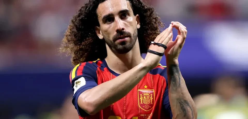 Player applauding fans wearing Spain jersey