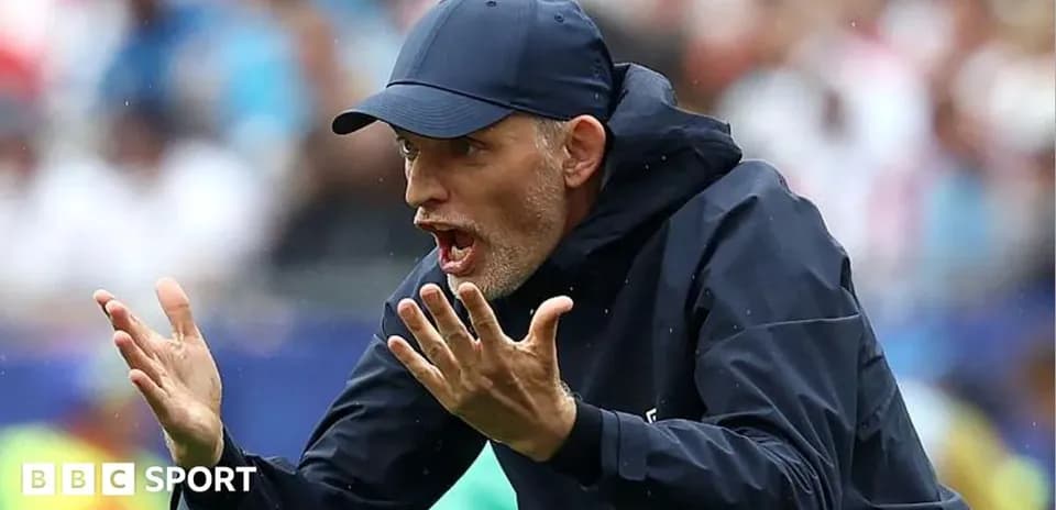 Coach gesturing during a match on the sidelines