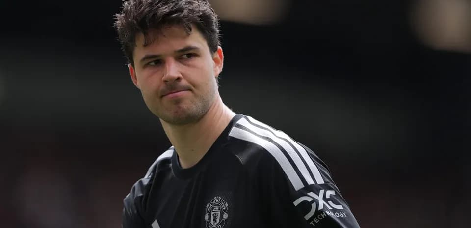 Goalkeeper in Manchester United jersey during match
