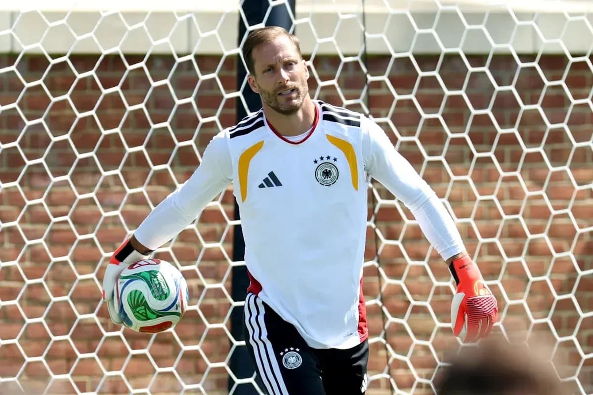 Goalkeeper holding a soccer ball in training