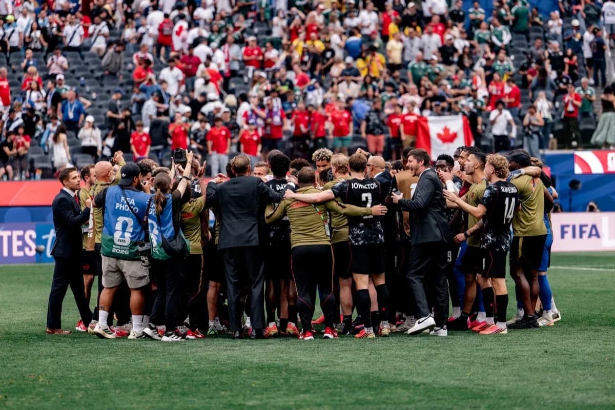 Canada team celebrating on the pitch