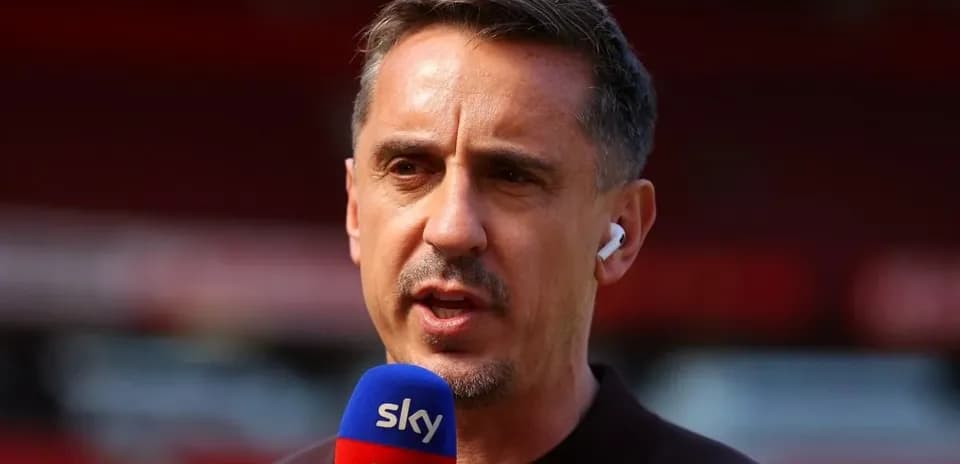 Sports analyst speaking into microphone during broadcast