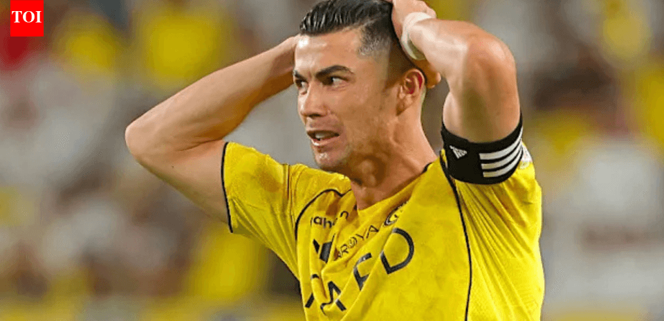 Player in yellow jersey showing frustration on field