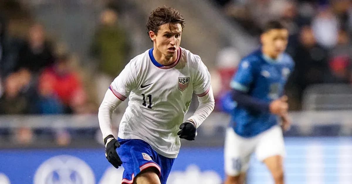 US player dribbling the ball during match