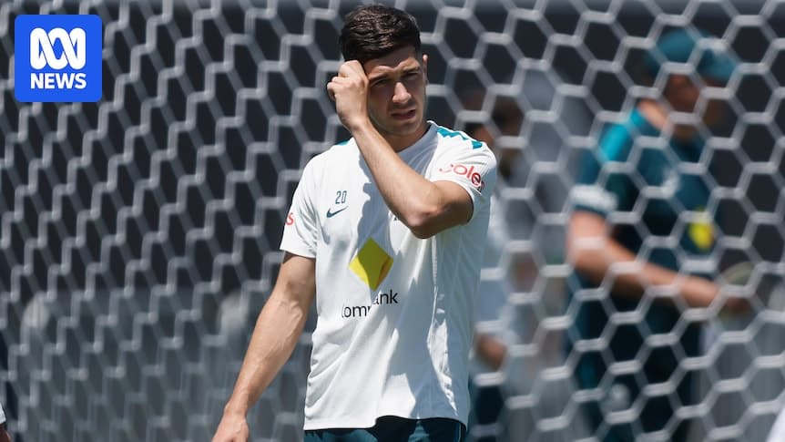 Player adjusting hair during training session