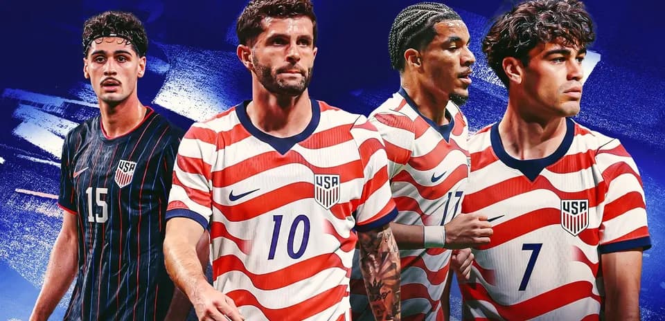 Four USA soccer players in team jerseys