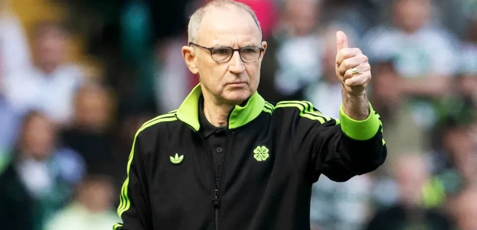 Coach giving a thumbs up during a match