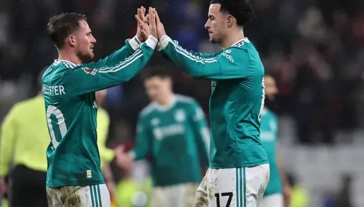 Two players celebrating after a successful play