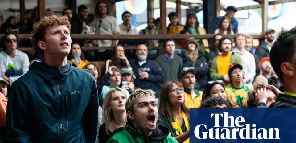 Crowd watching a sports event with various expressions