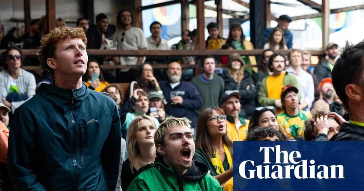 Crowd watching a sports event with various expressions