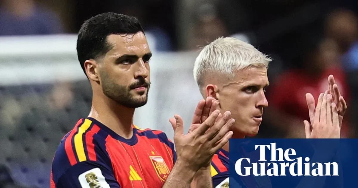 Two Spanish players applauding after a match