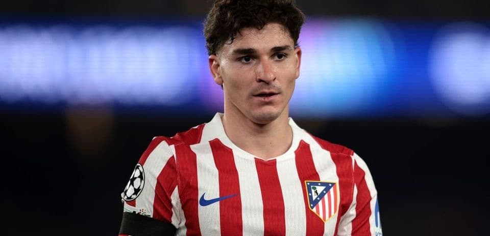 Atletico Madrid player in red and white jersey