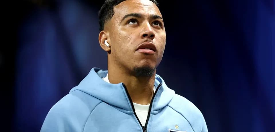 Player in England kit looking upwards before match