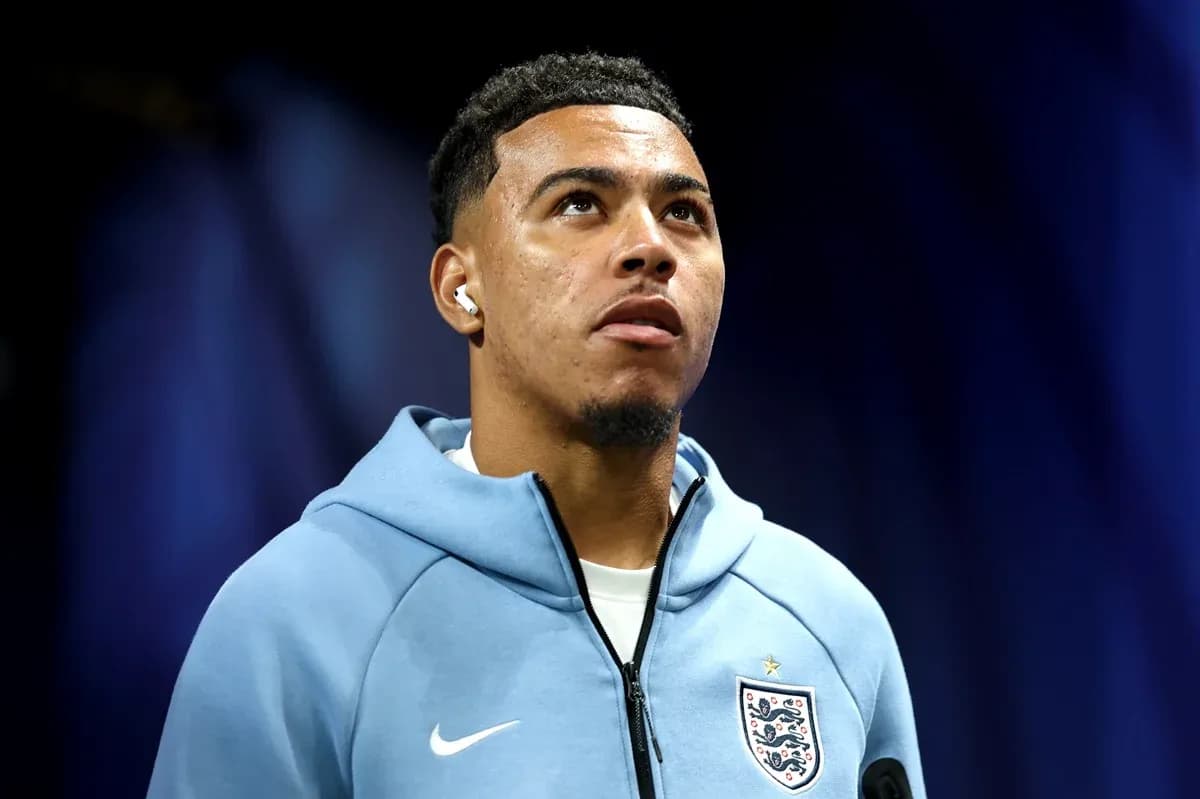 Player in England kit looking upwards before match
