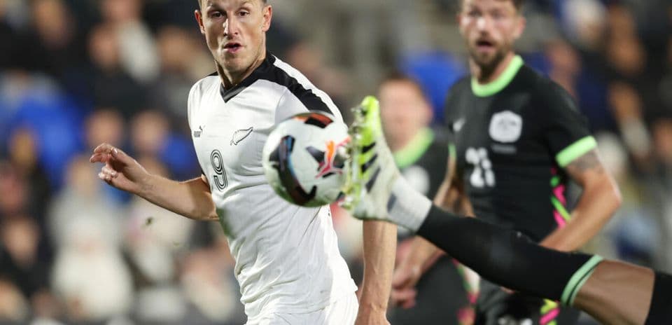 Player attempting to kick ball during match