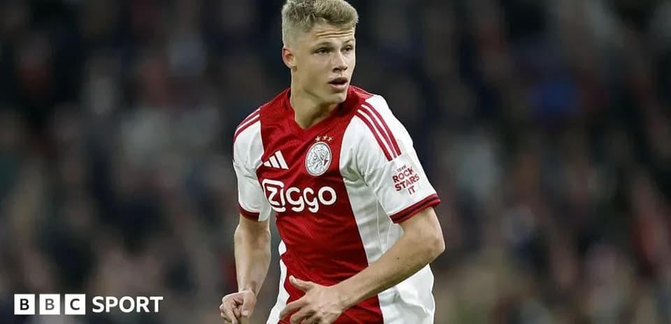 Player wearing Ajax kit during a match
