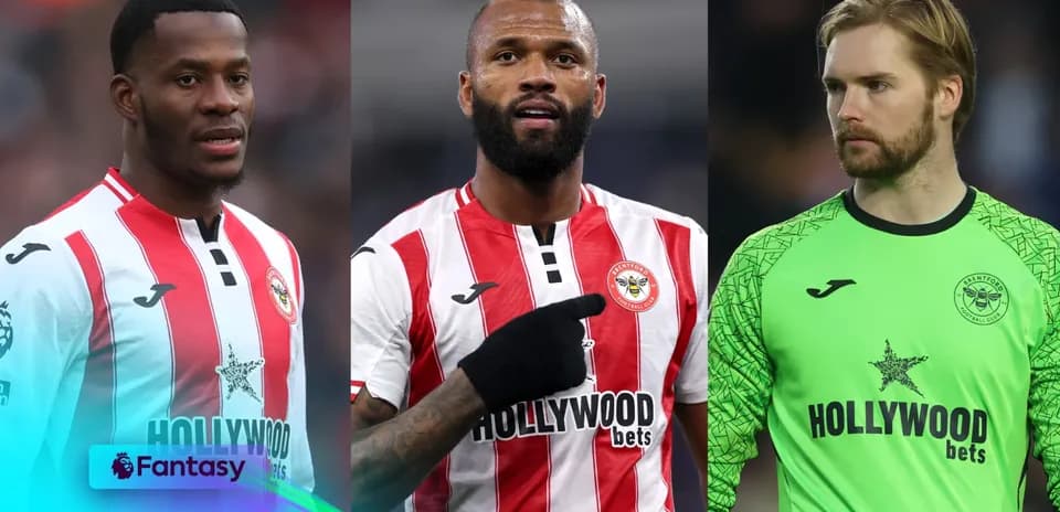 Three Brentford players in team kits posing together