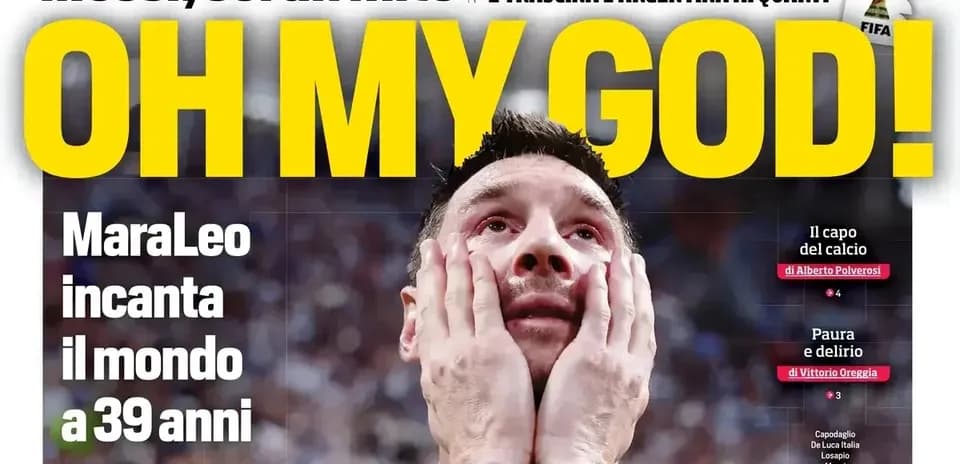 Lionel Messi with hands on his face in celebration