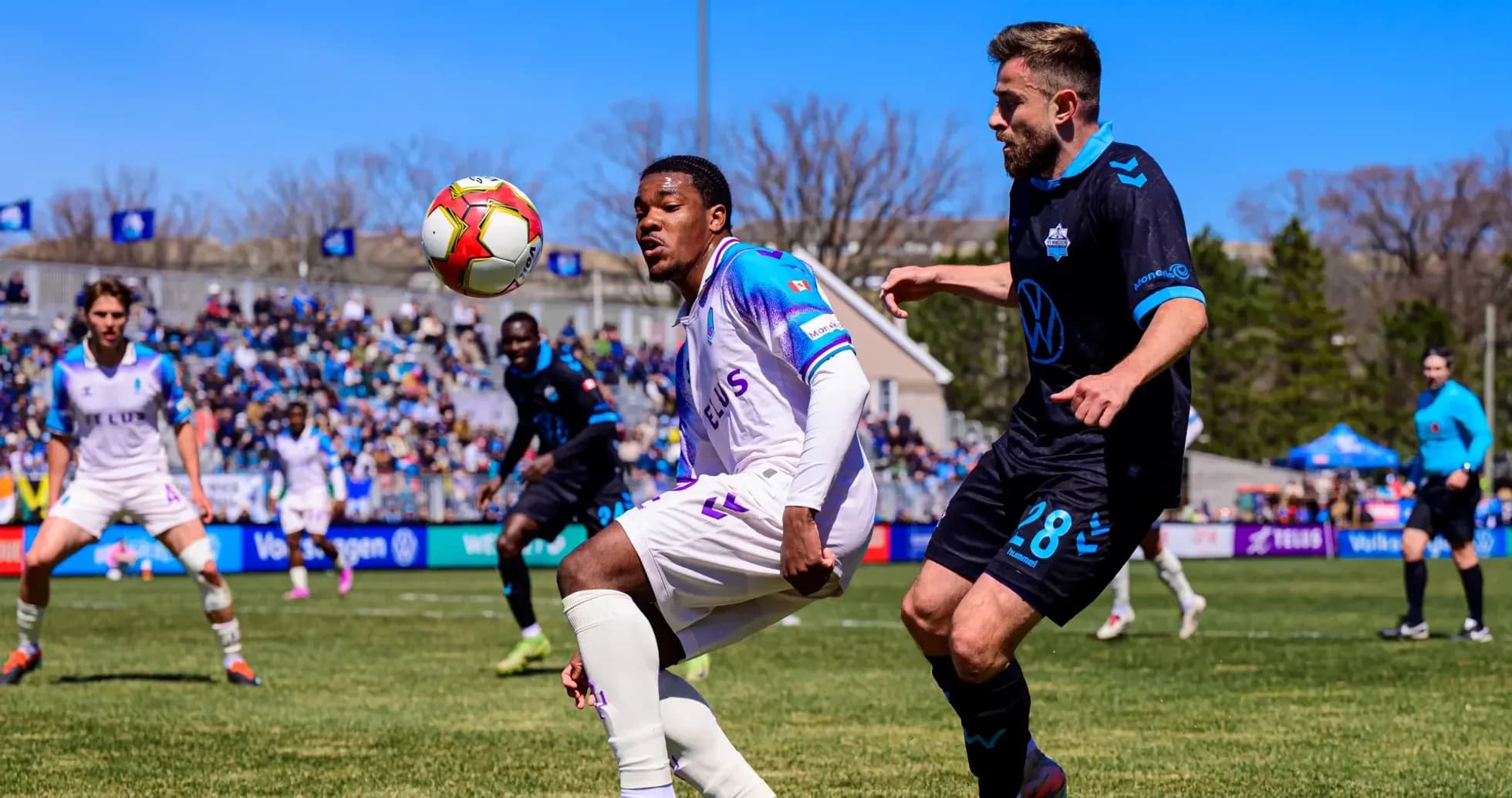 Player striking the ball during HFX vs Pacific match