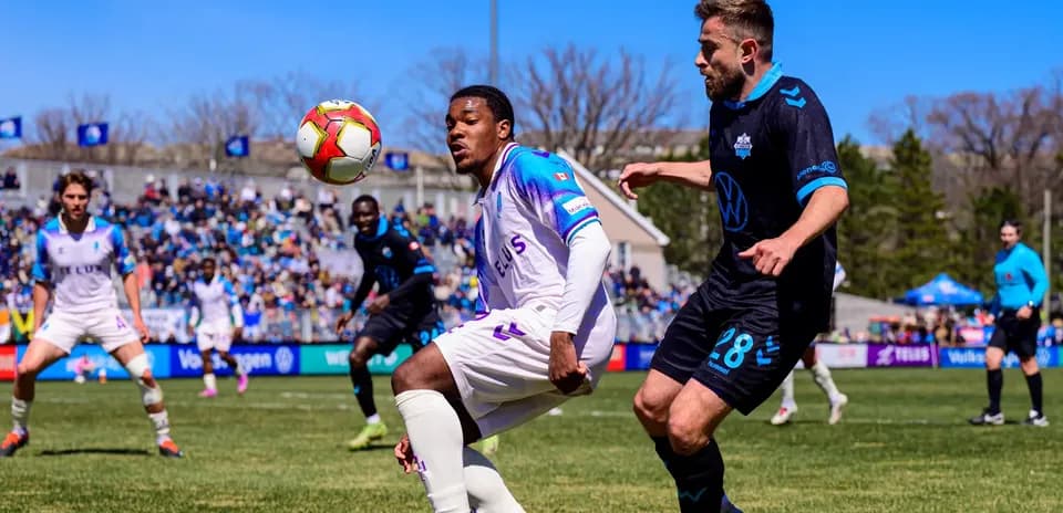 Player striking the ball during HFX vs Pacific match