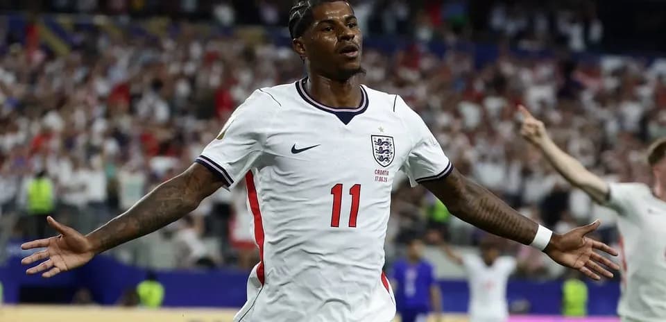 Player celebrating a goal during England match