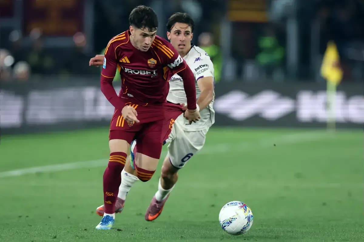 Player from AS Roma dribbling past opponent during match