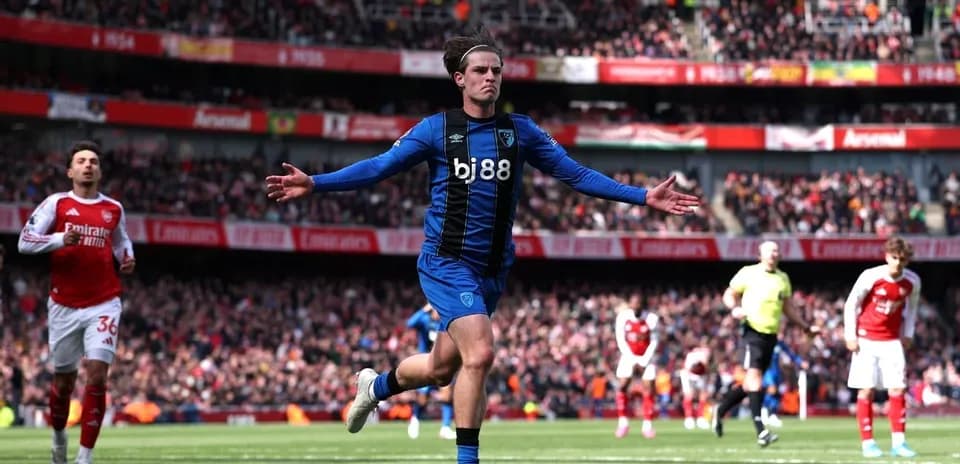 Bournemouth player celebrating a goal at Arsenal