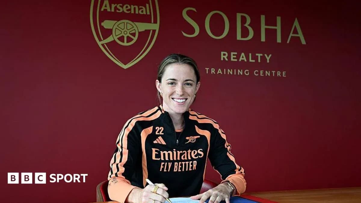 Player signing contract at Arsenal training center