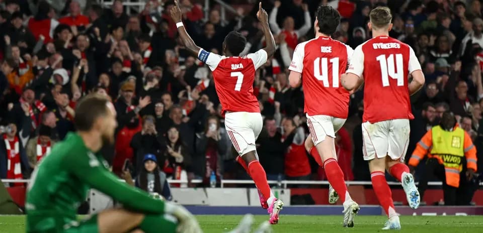 Bukayo Saka celebrating goal during match