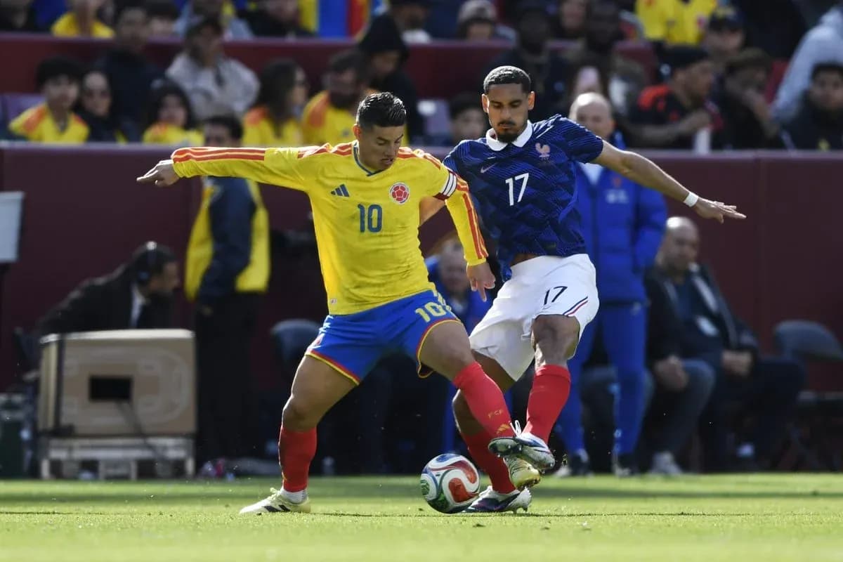 Colombia and France players contesting for the ball