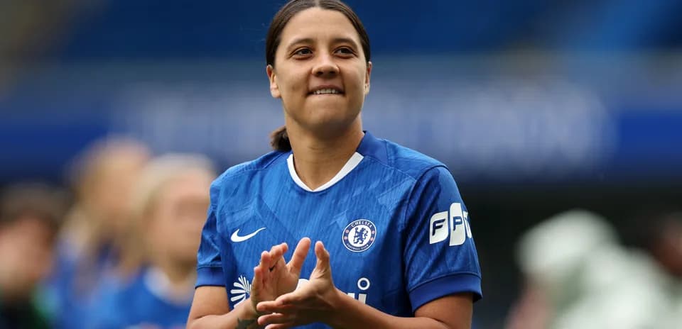 Player applauding while wearing Chelsea kit