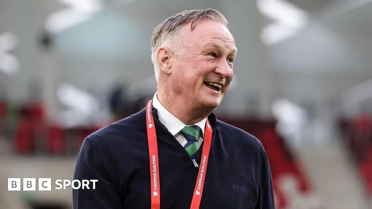 Coach smiling during a match day event