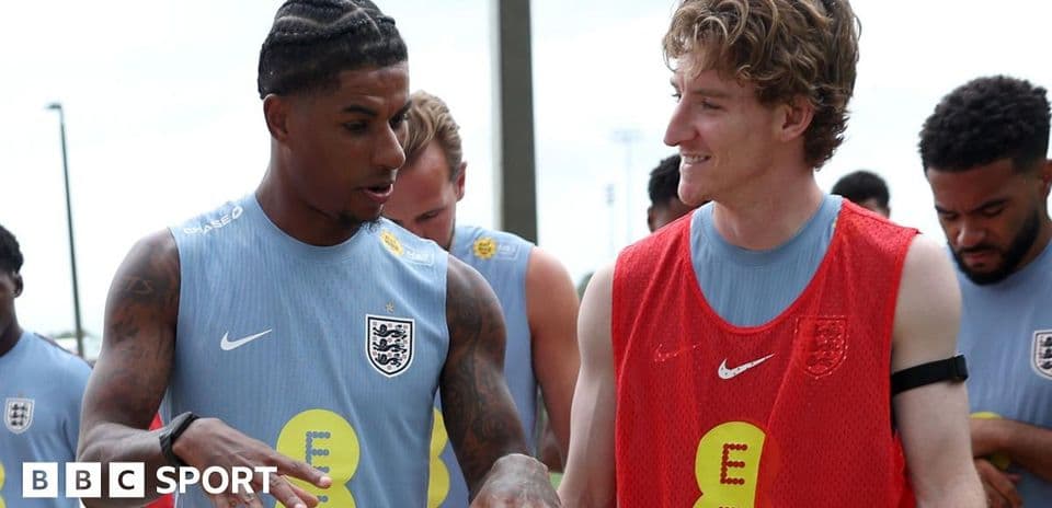 Two players conversing during training session