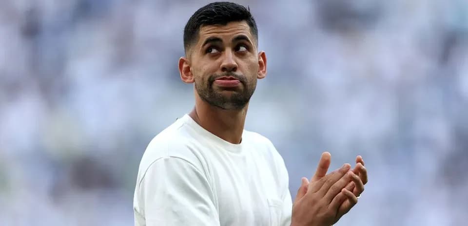 Player clapping and looking up during warm-up