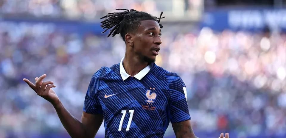 Player in blue jersey gestures during match