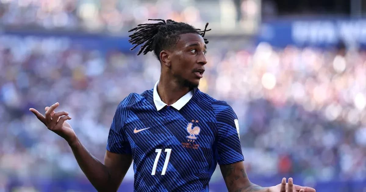 Player in blue jersey gestures during match