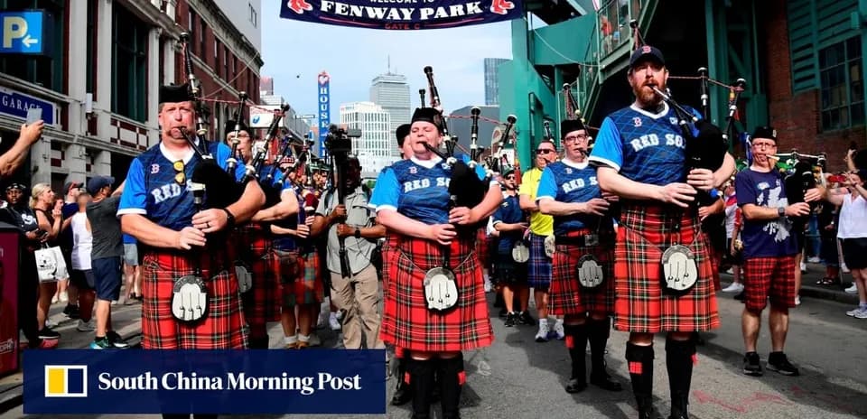 Bagpipe players in kilts at Fenway Park entrance