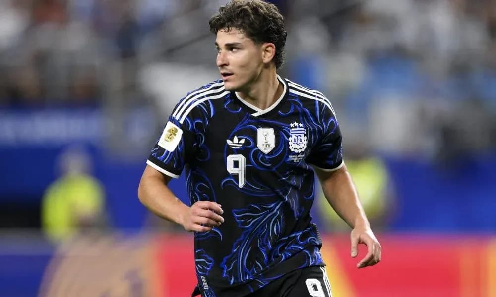 Player in Argentina jersey running on the field