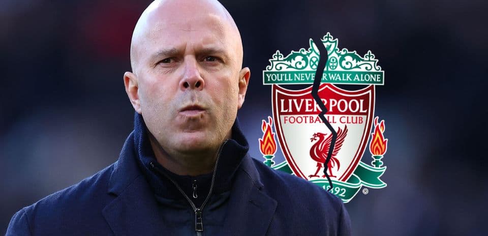 Coach with Liverpool FC logo in background